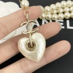 Chanel Double Strand Pearl Necklace with Heart Shaped Charm - Image 4