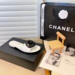Chanel Black Camellia Slides White - Image 4