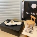 Chanel Black Camellia Slides White - Image 2