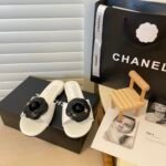 Chanel Black Camellia Slides White - Image 9
